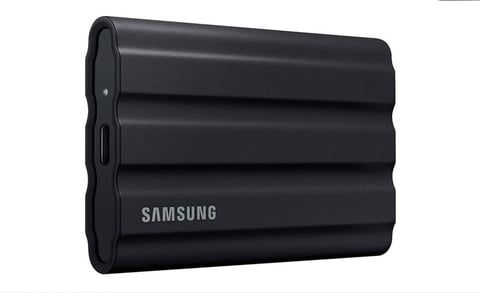 Samsung T7 Shield portable SSD external hard drive in black with ribbed design
