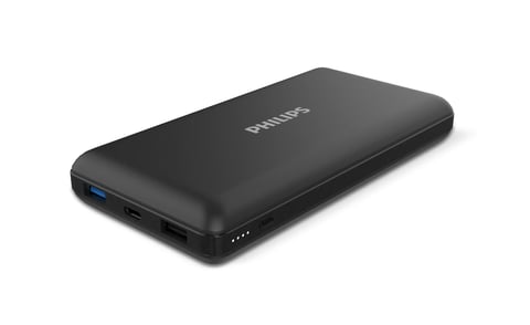 Black Philips portable power bank with USB ports and charging indicators on white background