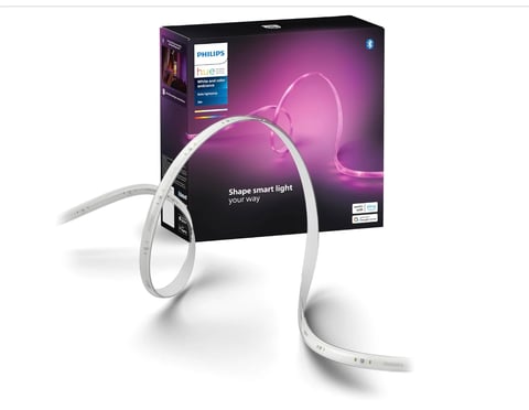 Philips Hue smart light strip with white flexible LED tube displaying pink glow beside its product packaging box