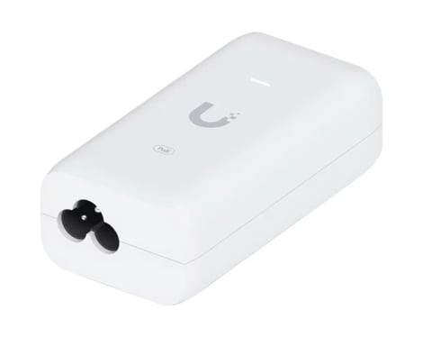 White compact PoE injector with power cable connection and Ubiquiti logo on top