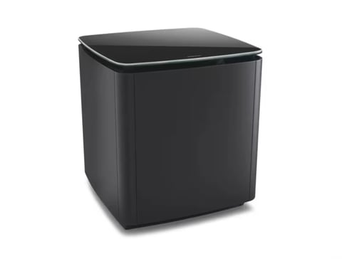 Black cubic subwoofer speaker with padded top and chrome accents on white background