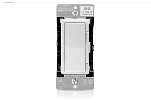 White and black dimmer switch with packaging and product information label, front view