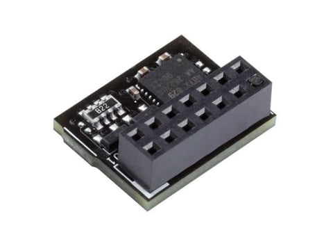 Black electronic circuit board module with integrated components and connector ports on silver base