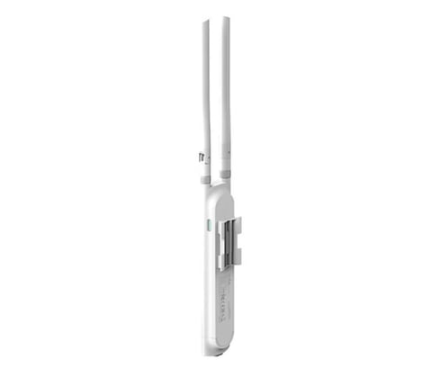 White wireless access point with two external antennas on light background