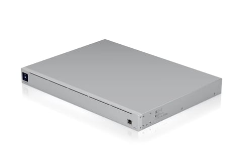 Gray metal network server or storage device with flat rectangular shape and front panel ports