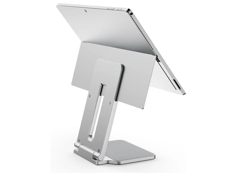 White tablet stand with adjustable tilting arm and metal base, holding a tablet at an angle