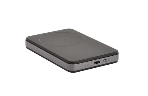 Gray rectangular wireless charging pad with circular charging area and USB ports