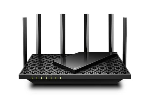 Black wireless router with six antennas and yellow port indicators on white background