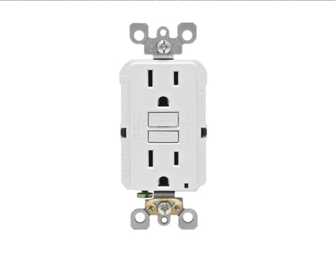 White electrical outlet with two receptacles and two reset buttons installed on white background