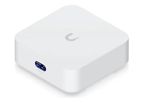 White Ubiquiti network access point with curved edges and blue port indicator on side