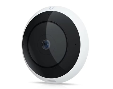 White and black circular security camera with lens on plain background