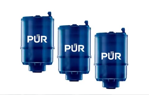 Three blue PUR water filter replacement cartridges displayed in decreasing size order