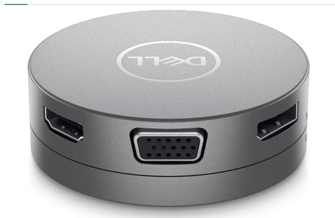 Gray Dell circular docking station with HDMI and VGA ports on white background