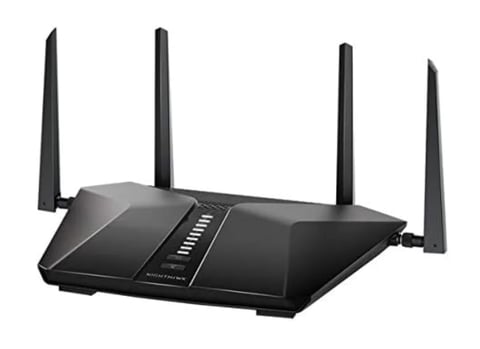 Black wireless router with four external antennas and illuminated control panel