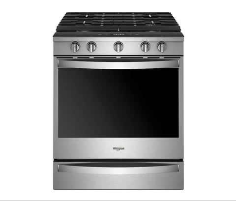 Stainless steel Whirlpool gas range stove with black cooktop and five burners