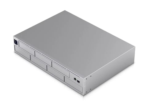Silver network storage device with multiple drive bays and front ports on white background