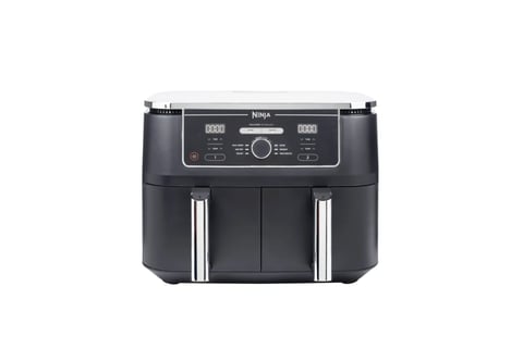 Black Ninja dual-basket air fryer with digital control panel and stainless steel handles on white background
