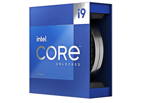Intel Core i9 unlocked processor retail box with blue packaging and metal cooler visible in window