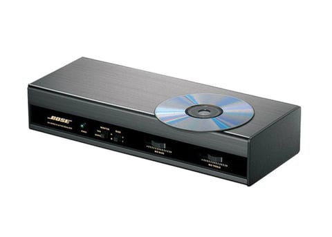Bose DVD player with a disc displayed on top, black rectangular device with silver top panel and control buttons